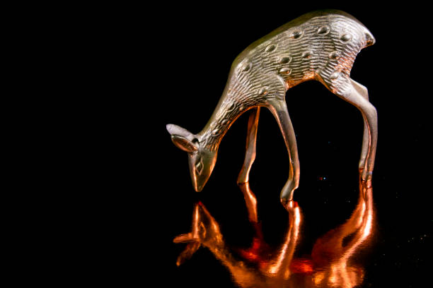 istock Forged bronze figure representing a small deer, a shape inspired by nature. 1225488551