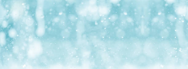 blue color tone of close up rain water drop falling to the floor in rainy season stock photo