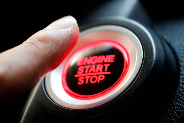 istock The driver's hand is pressing the car start button. Concept of transportation and technology 1225491995