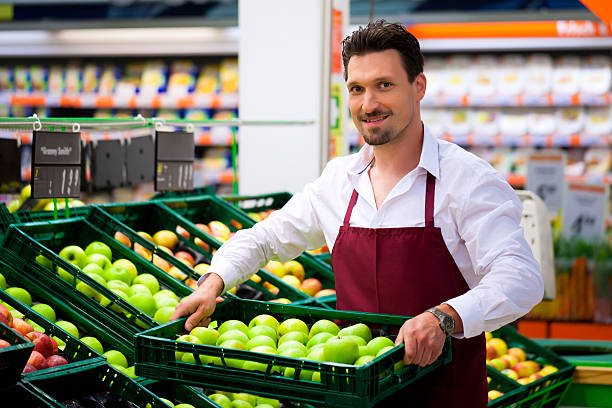 istock Man in supermarket as shop assistant 122549414