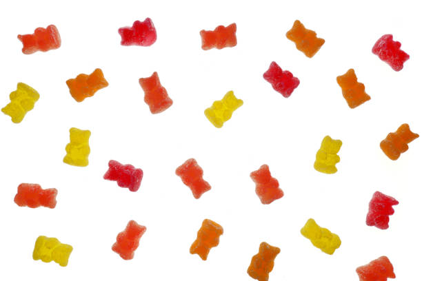 istock Gummy Bears Jelly Candy. Fruit Bears jelly in sugar Isolated on a white background.Fruit multi-colored sweets. Children's sweets. 1225496521