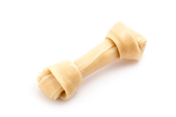 istock New dog chews (Rawhide) isolated on white background 1225496860