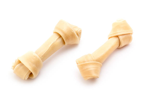 istock New dog chews (Rawhide) isolated on white background 1225496961