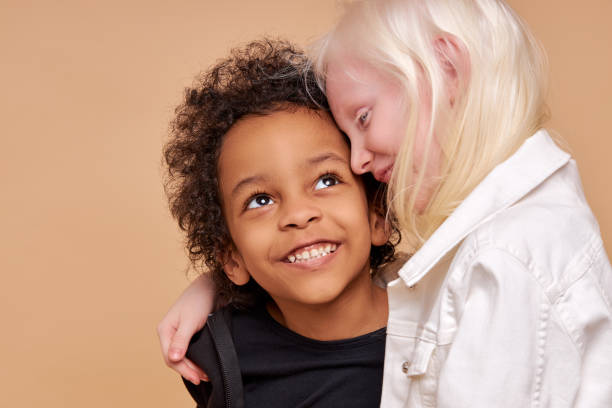 istock friendship between two children of different nationalities 1225497621