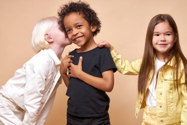istock beautiful kids have secret 1225497735