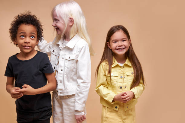 istock happy smiling kids isolated in studio 1225497739
