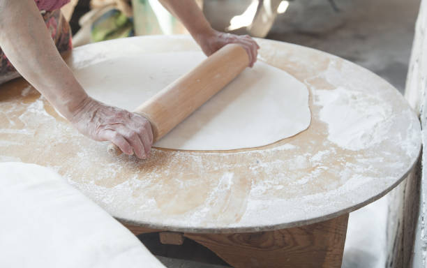istock Woman preparing armenian bread lavash. 1225499026