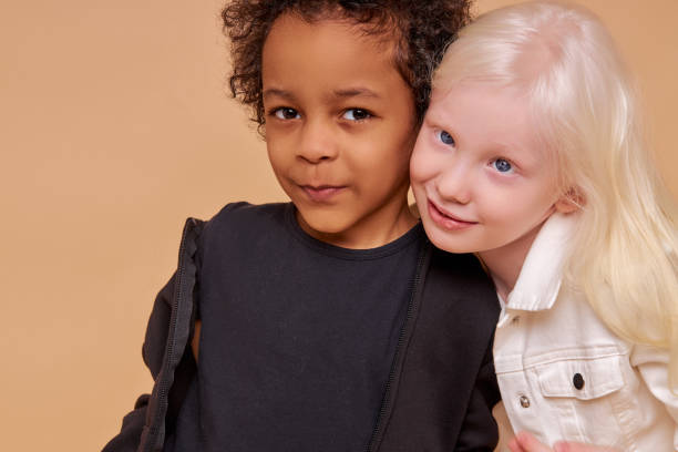 istock cute adorable diverse children posing at camera 1225500976
