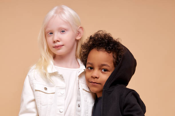 istock cute adorable diverse children posing at camera 1225501091