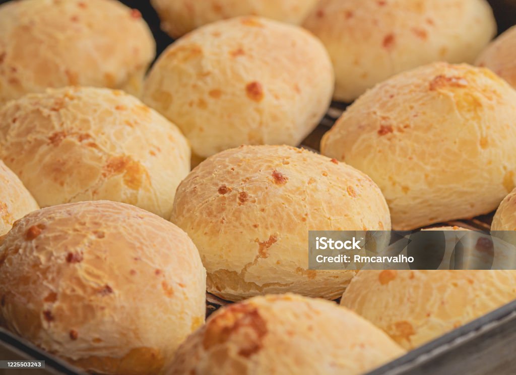 Cheese Bread - Brazilian food. Cheese Bread ( Pão de Queijo ) - Brazilian food. Typical food from Brazil based on tapioca flour and cheese. Pão De Queijo Stock Photo