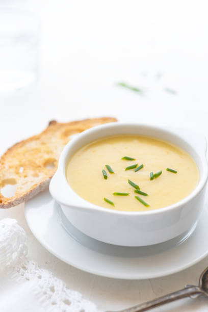 istock Potato cream soup on white backround 1225504193