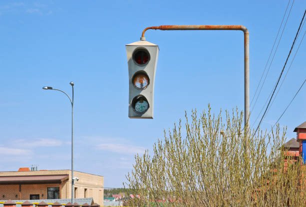 istock Vintage old traffic light on a rusty post. Close-up. 1225504343