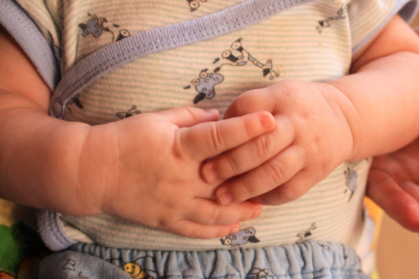 istock hands of a young child 1225505903