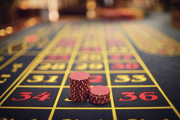 istock Roulette chips on a gaming table in a casino. 1225506885