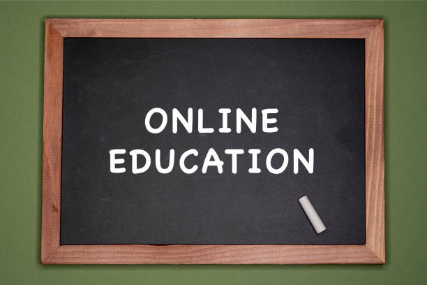 istock Online education written on chalkboard, green background 1225509149