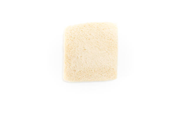 istock White no crust sandwich bread slice, on white background. 1225511033