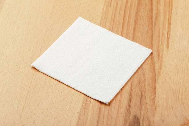 istock white paper napkin with a textured pattern on an old table 1225514286
