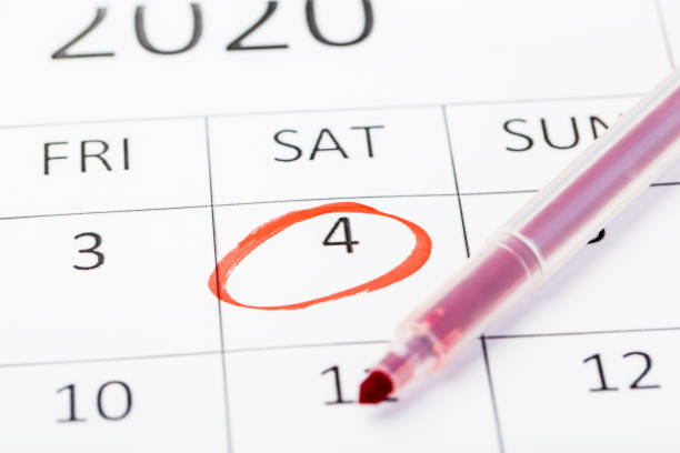 istock 2020 calendar page with pen. important date marked 1225514499