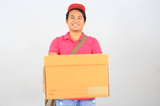 istock Parcel delivery person on white background 1225516018