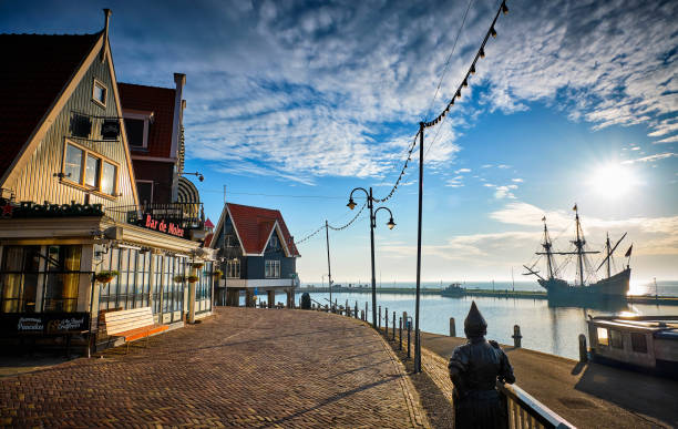 Volendam,the Netherlands Volendam is in North Holland, near Amsterdam. The famous tourist street in Volendam with souvenir shops, cafes and fish restaurants. Volendam is a historic fishing village on the IJsselmeer in North Holland. These photos of the empty streets and the port were taken during the pandemic in the spring of 2020.