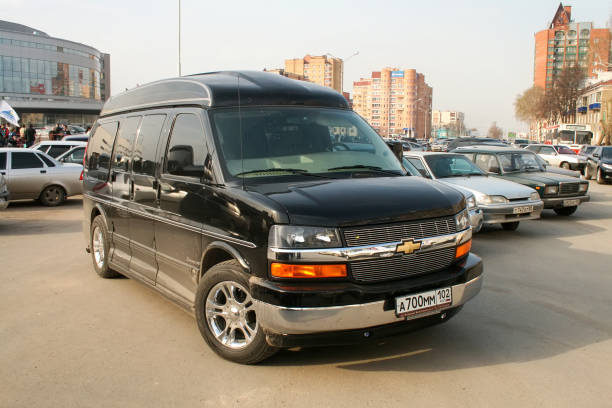 Chevrolet Express Ufa, Russia - April 11, 2008: Black luxury van Chevrolet Express in the city street. Chevrolet stock pictures, royalty-free photos & images