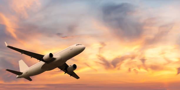 istock passenger plane takes off in a beautiful sunset sky 1225518700