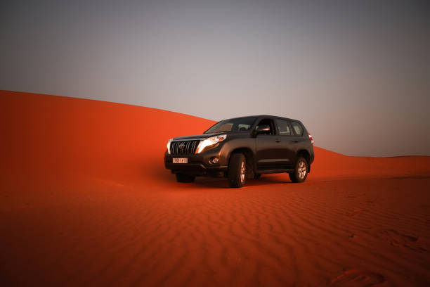 Nawan , Saudi Arabia  Jan 7 2023: 4x4 cars drift across Saudi Arabias striking sand desert. The vehicles perform thrilling maneuvers, on sand dunes
