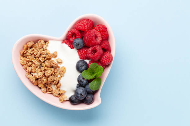 istock Healthy breakfast with granola, yogurt and berries 1225521460