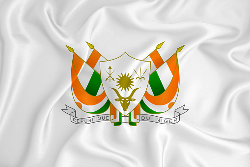 A developing white flag with the coat of arms of Niger Country symbol. Illustration. Original and simple coat of arms in official colors and the right proportion