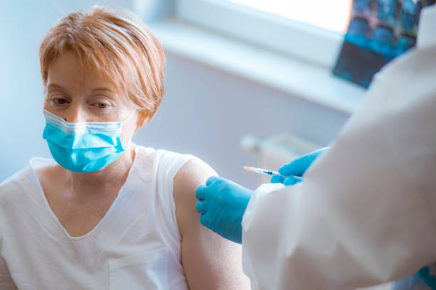 istock Doctors against Corona virus - Testing and vaccination 1225522779