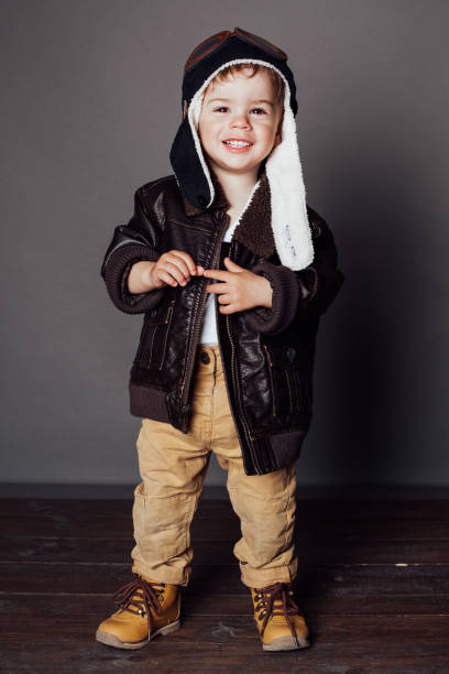 istock little boy pilot plays in airplanes kids 1225522840