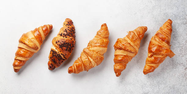Fresh tasty croissants Fresh tasty croissants. Breakfast meal. Top view flat lay wide cake stock pictures, royalty-free photos & images