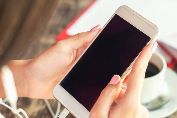 istock Woman hands holding smartphone. 1225525054