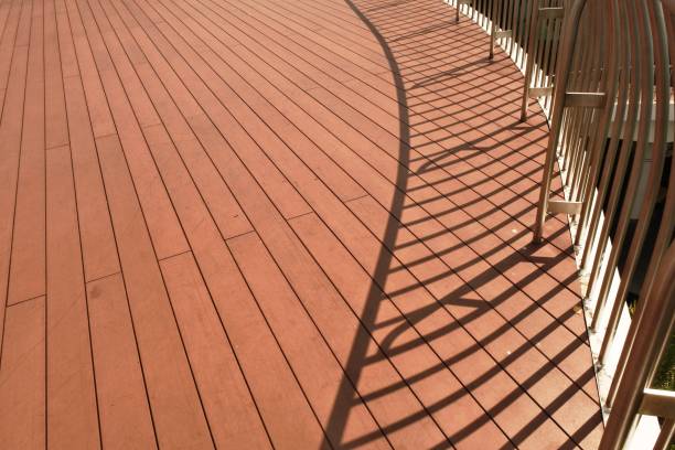 istock fence details of the building and its shadow as background 1225525461