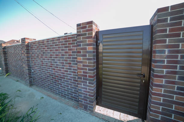 istock Brick new house in one floor.f ence. gate 1225531706