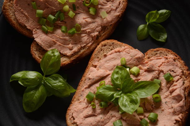 istock Chicken or goose liver pate sandwiches on a plate 1225533163