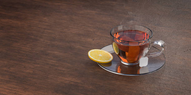 istock Cup of tea on wooden table. 1225535031