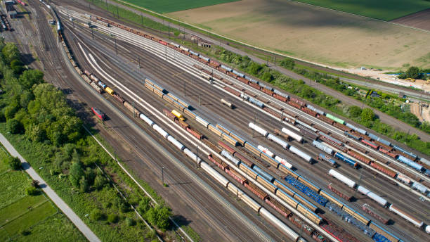 istock Railyard, shunting yard and freight trains - aerial view 1225536945