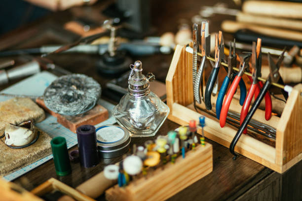 istock set of goldsmith's tool on the desk 1225538328