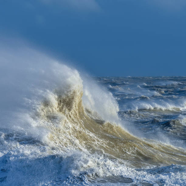 istock Amzing image of individual wave breaking and cresting during violent windy storm with superb wave detail 1225538869