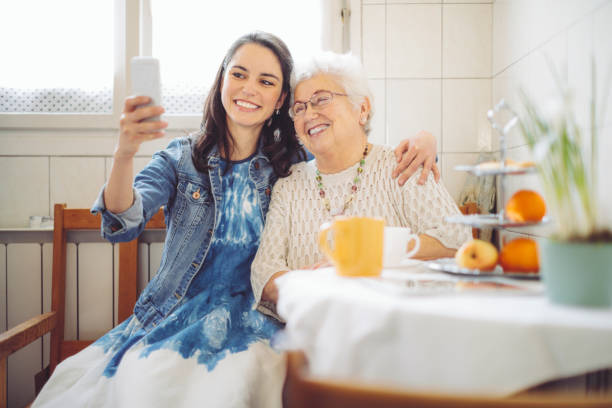 istock Social worker is visiting a senior woman 1225541321