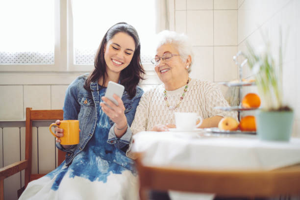 istock Social worker is visiting a senior woman 1225541496