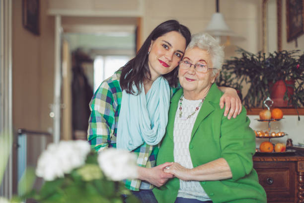 istock Social worker is visiting a senior woman 1225541549