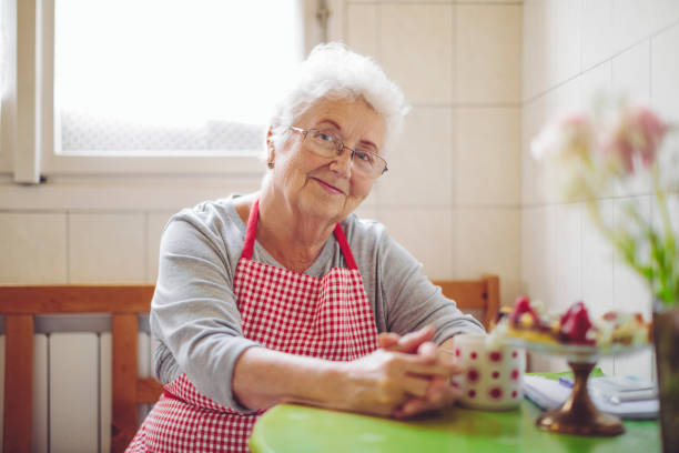 istock Beautiful senior woman is looking confidently at camera 1225542341