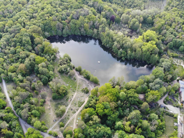 Aerial view of lake Teufelssee a glacial lake in the Grunewald forest in the Berlin borough of Charlottenburg-Wilmersdorf. stock photo