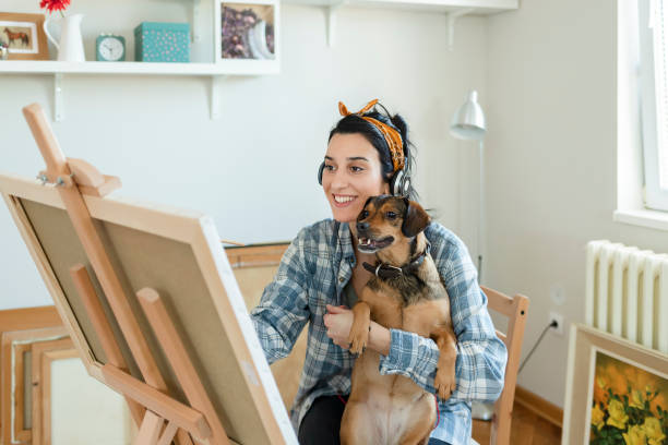 istock Female Artist Painting 1225544253