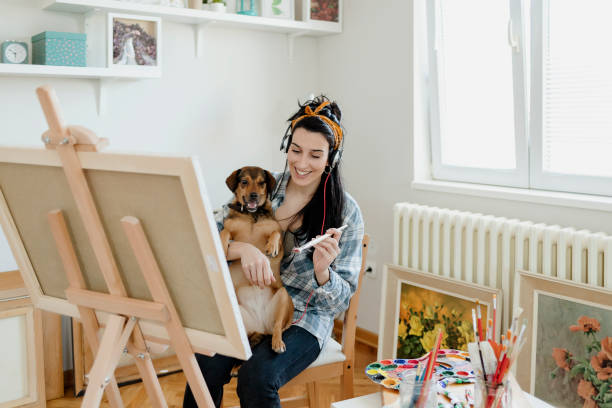 istock Female Artist Painting 1225544276