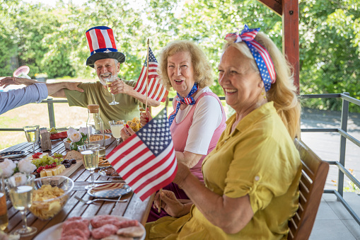 Senior friends celebrating US Independence Day