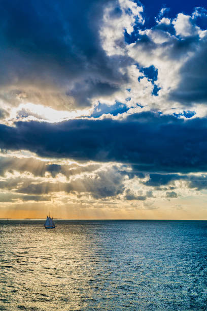 istock Sailboat in Stormy Sunset 1225544602