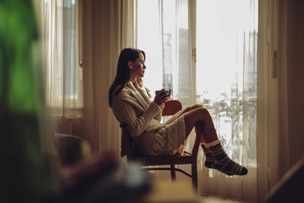 istock Young woman at home 1225544796